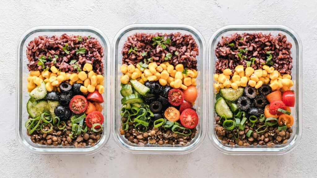 three meal prep bowls