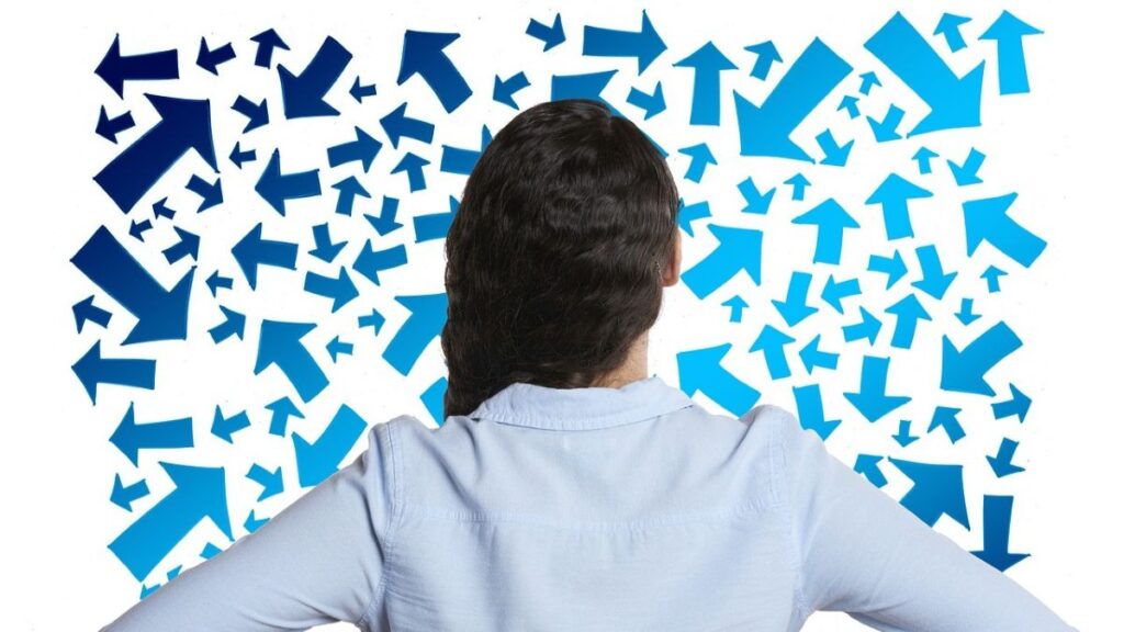 woman confronted with multiple choices.